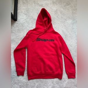 Snap on hoodie. Size medium. Never worn. Unisex.